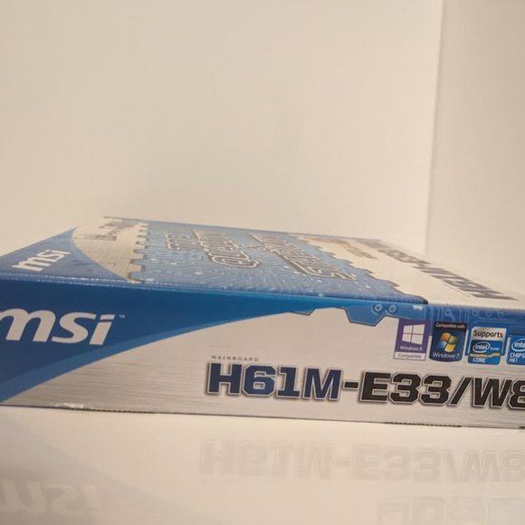 New in box MSI H61M-E33/W8 Motherboard - Picture 2 of 8